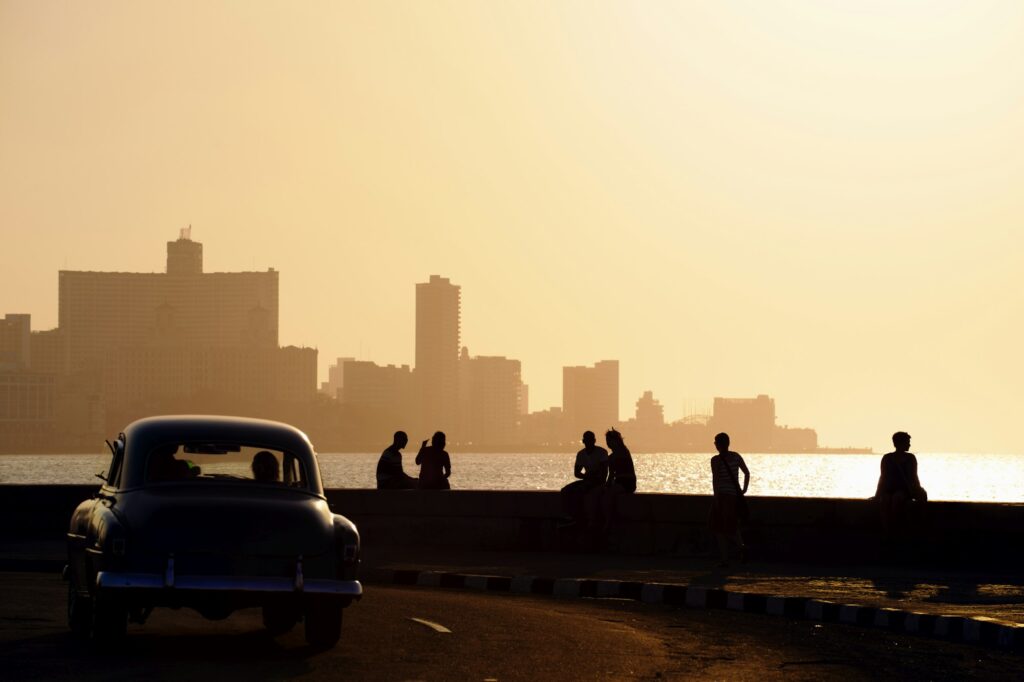 People And Skyline Of La Habana Cuba At Sunset