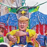 Allegorical car with Donald Trump doll during performing Grand show Mardi Gras parade